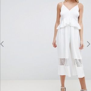 ASOS DESIGN Cami Jumpsuit with Peplum and Lace
